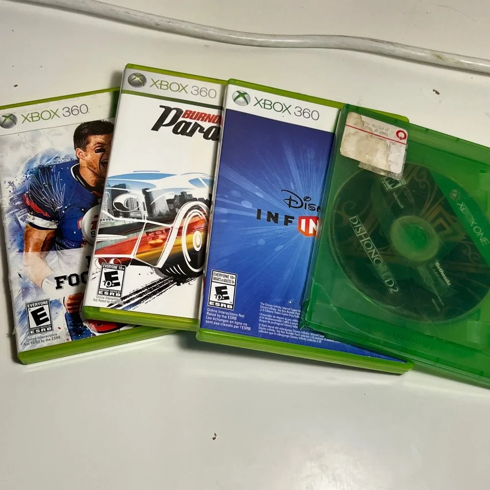 Microsoft Xbox 360 & Xbox One‎ Game Bundle Burnout Disney Dishonored NCAA 10